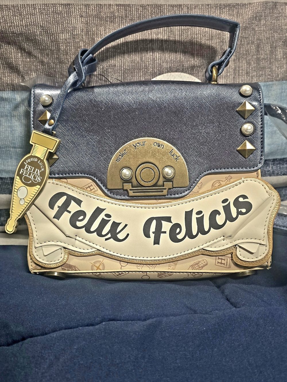 Harry Potter Felix Felicis purse with gold and black design